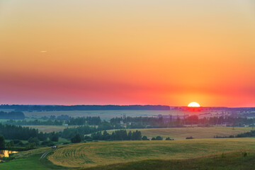 Fototapeta premium Vibrant sunset in russian countryside