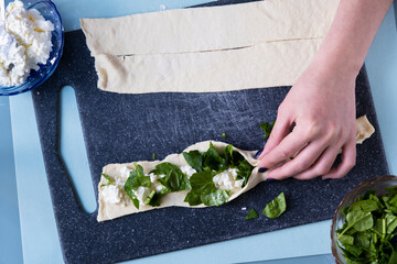 Cheese spinach pie. Salty cake recipe. Step by step. View from above. The girl is cooking. Step 11 © Дарья Сахарова