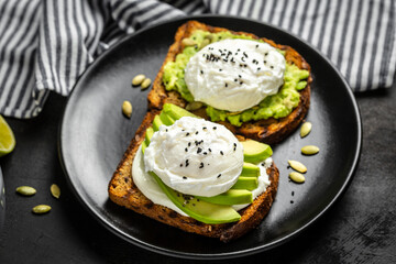 Poached egg avocado toast, Vegetarian food concept. Clean eating. Top view