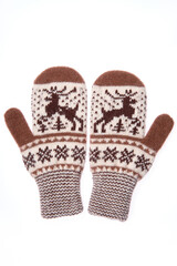Warm woolen knitted mittens isolated on white background. Knitte