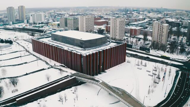 Modern music concert hall NOSPR in Katowice, Poland in snowy winter aerial drone view 4k