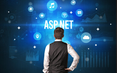 Rear view of a businessman with ASP.NET inscription, modern technology concept