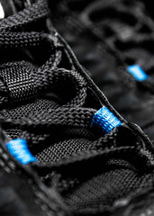 Sneakers laces closeup, Sport shoes with black lances, Detail of blackshoe laces on casual shoes