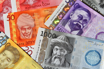 a current money of kirguistan with selective focus