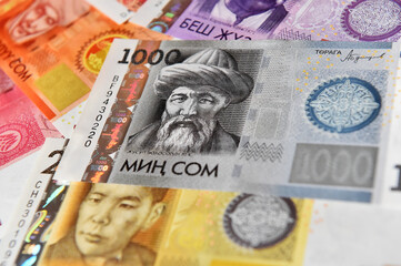 a current money of kirguistan with selective focus