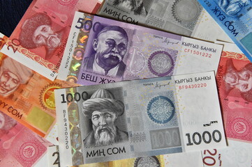a current money of kirguistan with selective focus