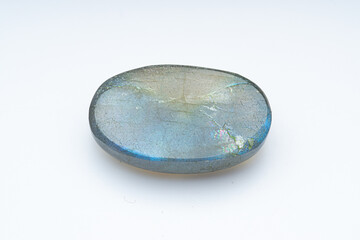 Natural stone labradorite on a white background