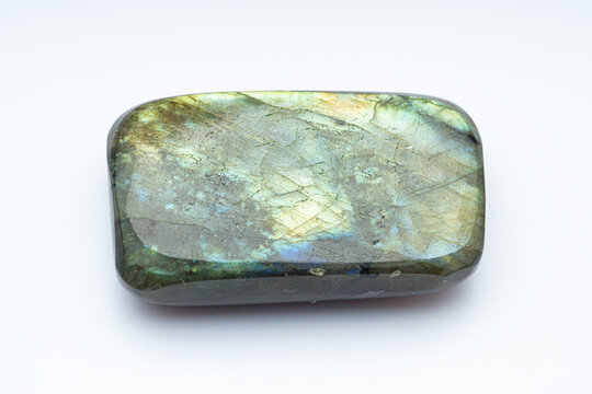 Natural stone labradorite on a white background