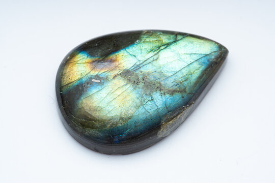 Natural stone labradorite on a white background