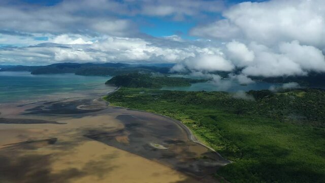 blue water golfe dulce brown water river zancudo Golfito bay aerial Costa Rica