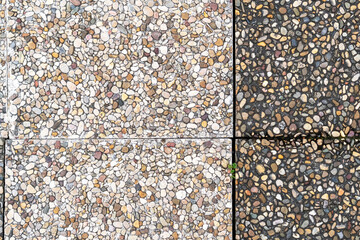 Fototapeta premium Pebble stone in outdoor tiles with geometric shapes