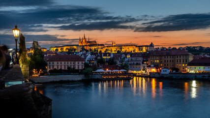 Fototapeta na wymiar View of Prague old town, historical center with Prague Castle, St. Vitus Cathedral, Charles Bridge Karluv Most, Vltava river, evening view, Czech Republic