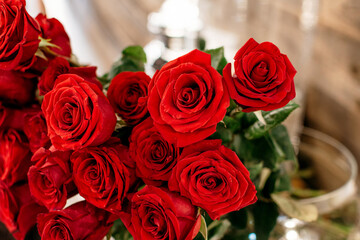 Bouquet of red roses on the table