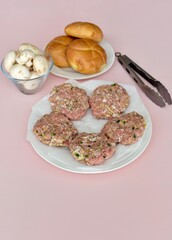 Ingredients ready for preparing homemade hamburgers for summer grilling and picnics. Photo concept food, background, lifestyle. Flat lay copy space. 