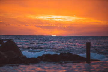 Sun rise over the horizon of the ocean