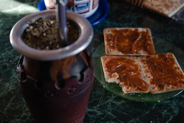 Mate and galletitas (biscuits) with dulce de leche | traditional  Argentinean breakfast