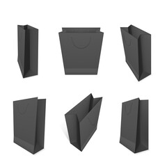 Paper shopping bags realistic mock ups set. Black packaging for goods with handles.