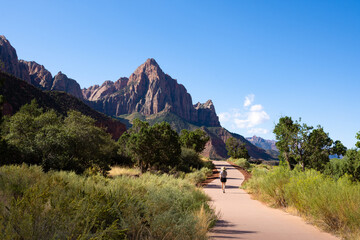 Woman walking on the Pa'rus Trail in Zion National Park in Utah, USA