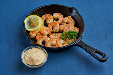 Red prawns prepared at wok