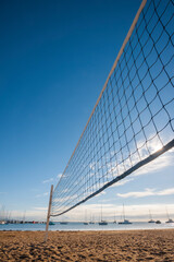 Volleyball net on a sandy beach