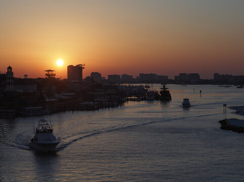 Charter Fishing Boats Leaving Destin Harbor At Dawn