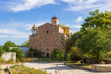 Fototapeta na wymiar The ancient Armenian church of Archangels Michael and Gabriel in Feodosia, Crimea. Built in 1408.