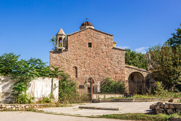 Fototapeta na wymiar The ancient Armenian church of Archangels Michael and Gabriel in Feodosia, Crimea. Built in 1408.