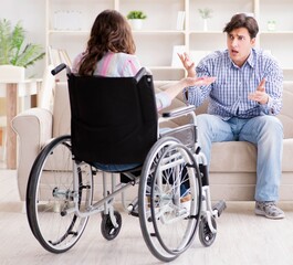 Fototapeta na wymiar Desperate disabled person on wheelchair