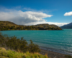 Obraz premium Waves created by the wind on the turquoise color lake in Patagonia Chile. 