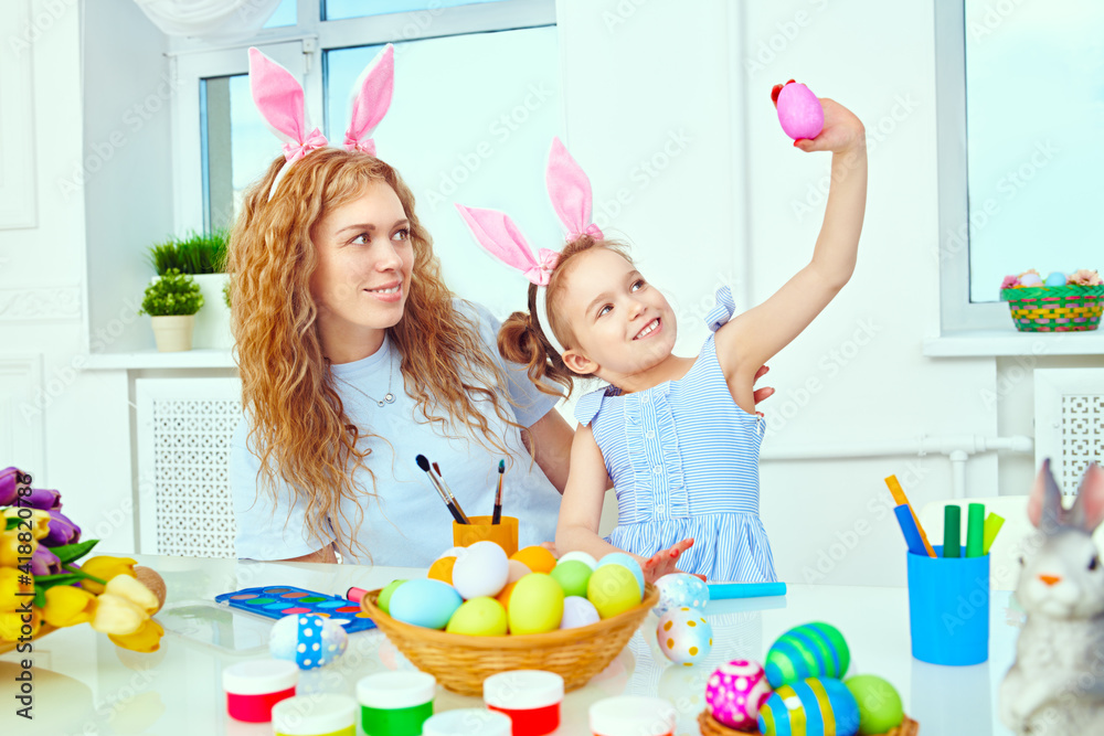 Wall mural family preparing for Easter