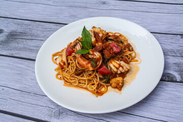 Spicy Seafood Spaghetti is a food that is decorated within plate beautifully and It is a popular food