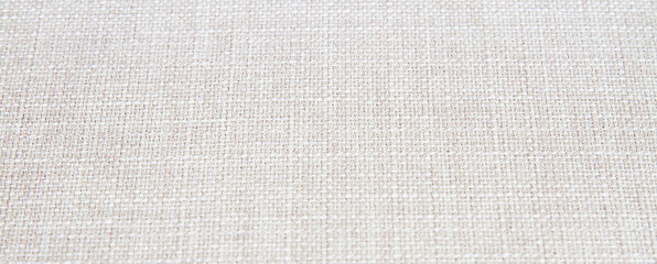 Texture of beige woven fabric; Close up of rustic white cloth
