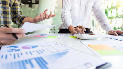 young business managers crew working with new startup project working with plan on office desk and modern digital computer