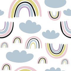 Hand drawn cute rainbow seamless pattern. Rainbow print for baby textiles, fabrics and baby shower cards.