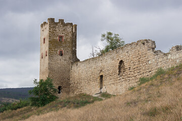 Fototapeta premium The tower of Clement in the Genoese fortress in Feodosia, XIV century, Crimea. 
