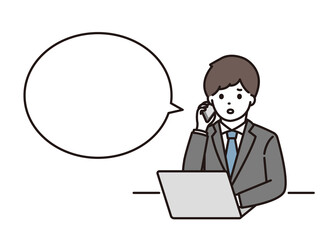 パソコンの前で困りながら電話をするスーツ姿の若い男性 吹き出し