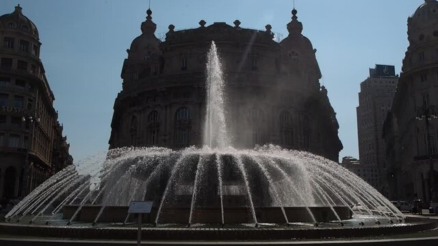 water games of the large round fountain in De Ferrari square.Genoa, Liguria, Italy.