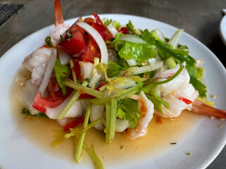 Thai spicy glass noodle salad with seafood called Yum Won Sen Talay