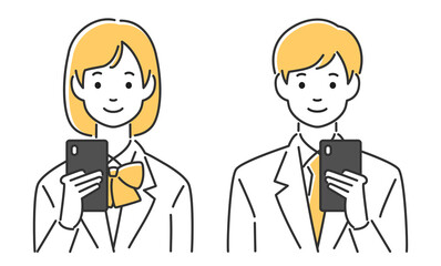 笑顔でスマホを見る学生の男女