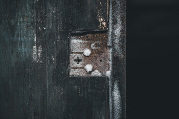 frozen door lock. old door with a broken lock.