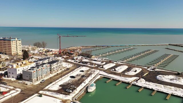 Aerial view of town of Port Washington, Wisconsin. Daytime, sunny sky, winter