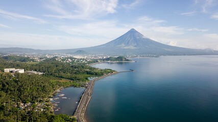 Drone shot of boulevard with Mayon Volcano