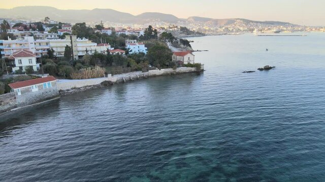 A low pass drone flight near the roof of a historical house at Mytilini. THe house is from the start of the 20th century and is located at the left of the entrance of the port of Mytilini