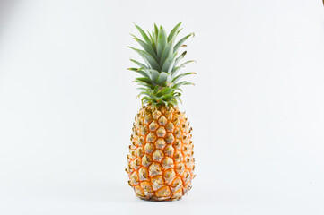 Pineapple over white background. Tropical fruit.