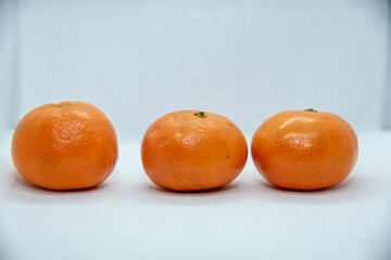 Tangerines on a wooden table