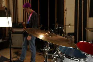 Fototapeta na wymiar High-hat and crash cymbal close-up in the studio. Drum kit