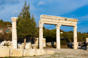 Fototapeta premium View of remains of marble pillars of agora after reconstruction in ancient city of Kibyra in Burdur Province, Turkey