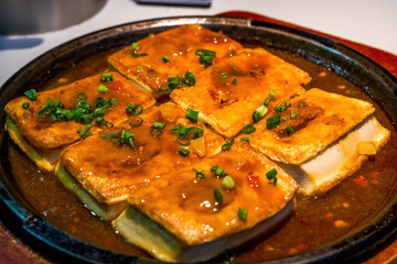 A delicious Chinese dish, braised tofu in abalone sauce