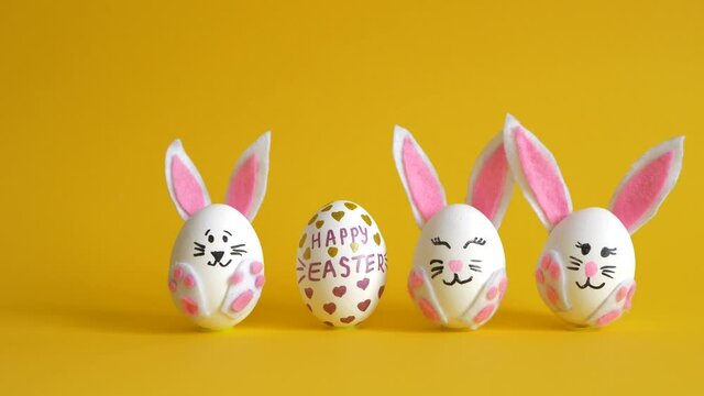 Unusual sets of Easter eggs on a yellow background. Feast of Holy Easter. 