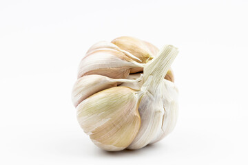Head of garlic by close up  isolated on a white background.
